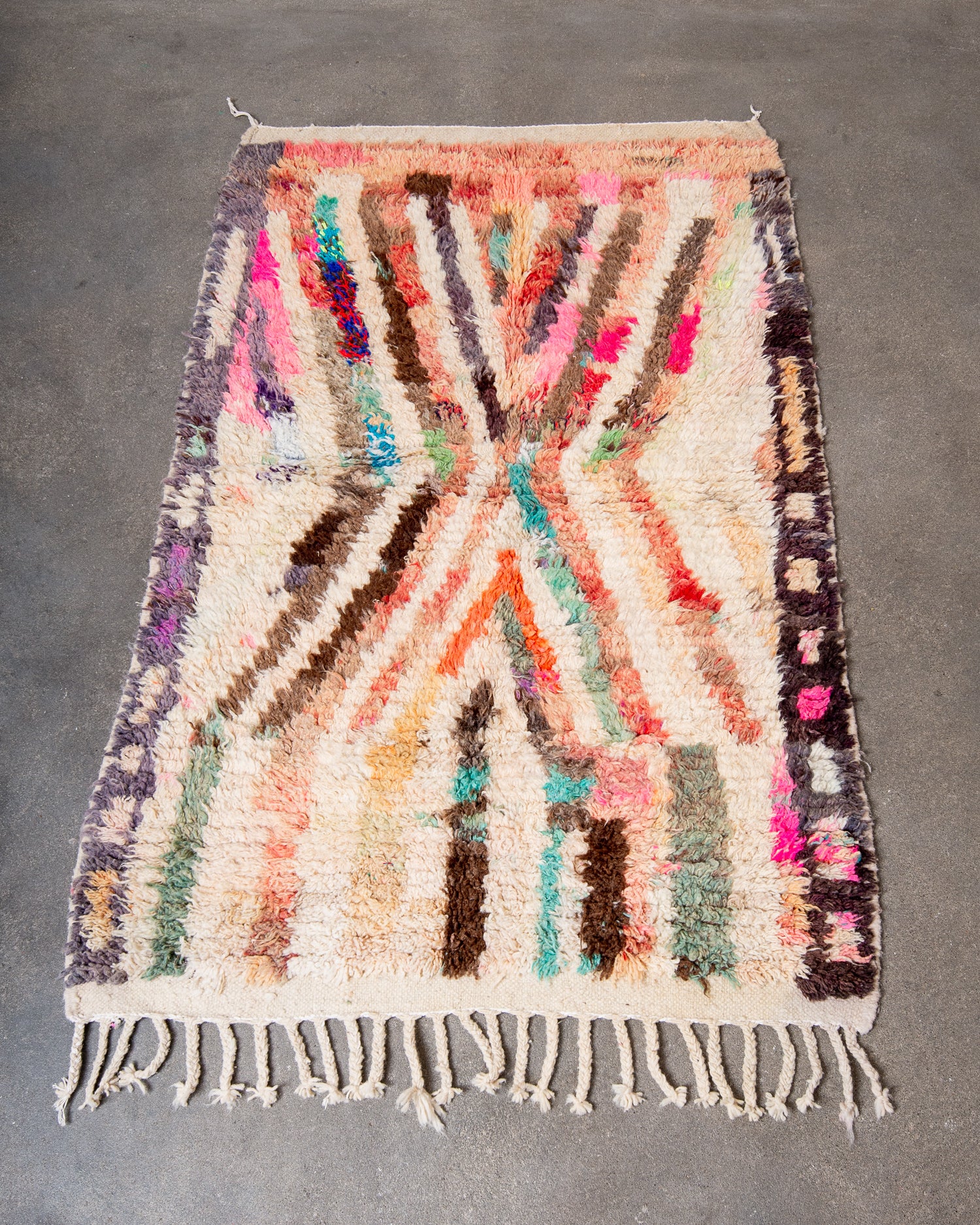 Modern, designer, handcrafted Berber rug from Morocco. Vintage carpet with beautiful colours and patterns and fluffy texture.